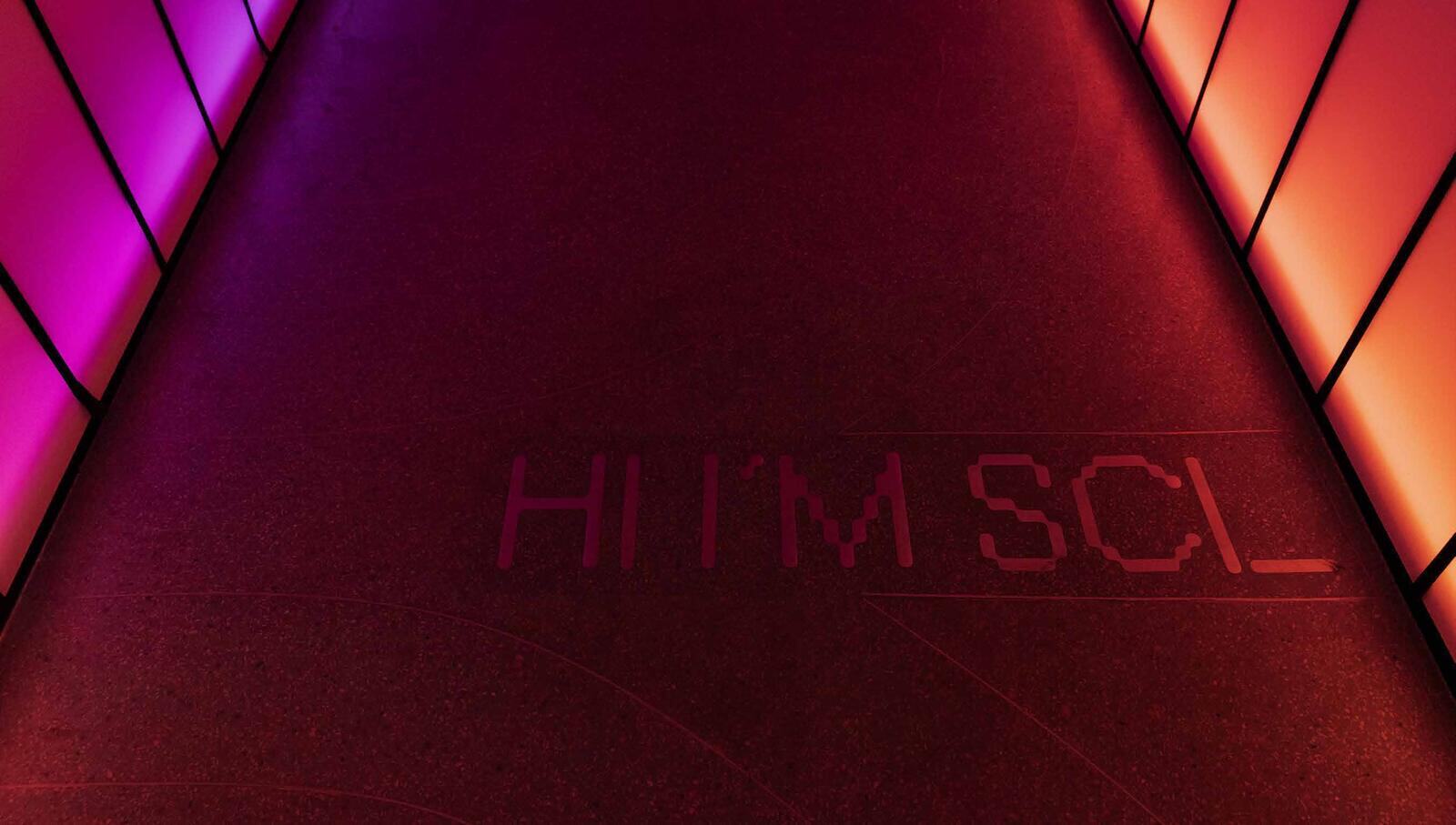 Hi Im Sci entrance with the name inlaid in the floor