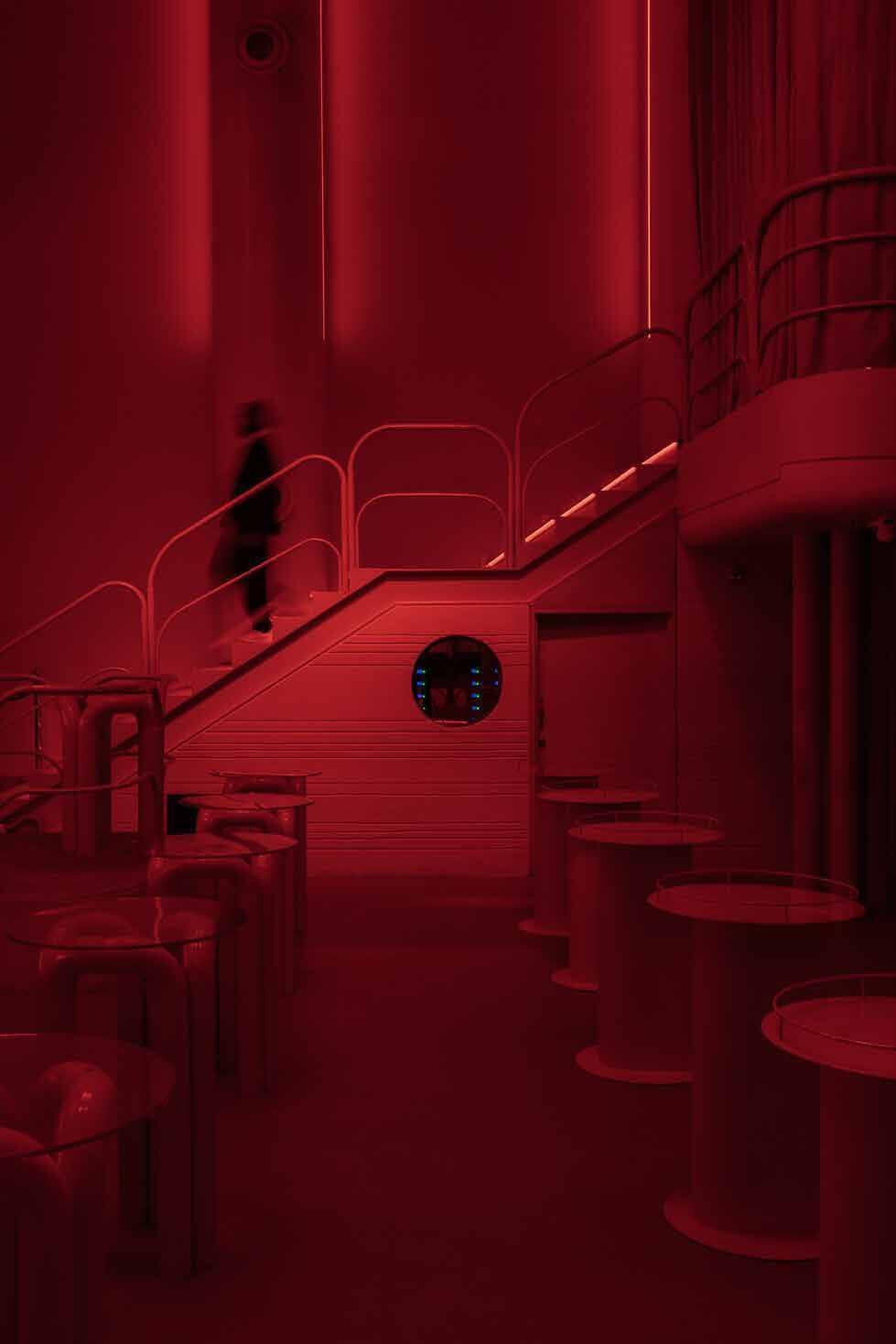Red-lit staircase at Hi Im Sci