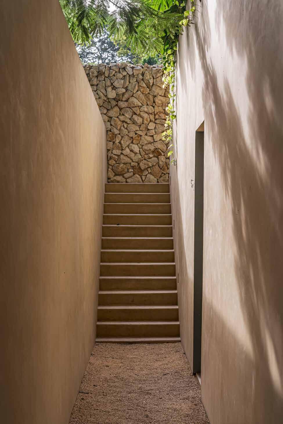 Stair between earthen walls at Arde La Selva